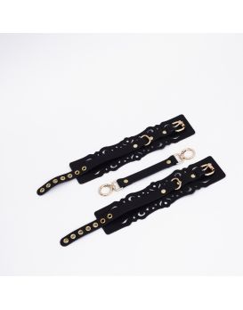 Черный кожаные оковы с узорами и золотистой фурнитурой