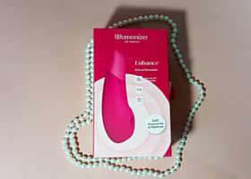 Клиторальный стимулятор 2 в 1 Womanizer Enhance